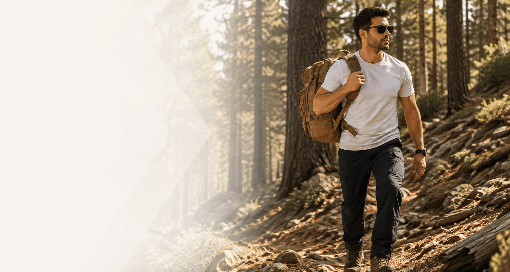 Home 87 Man hiking a forest trail wearing 5.11 Apex cargo pants